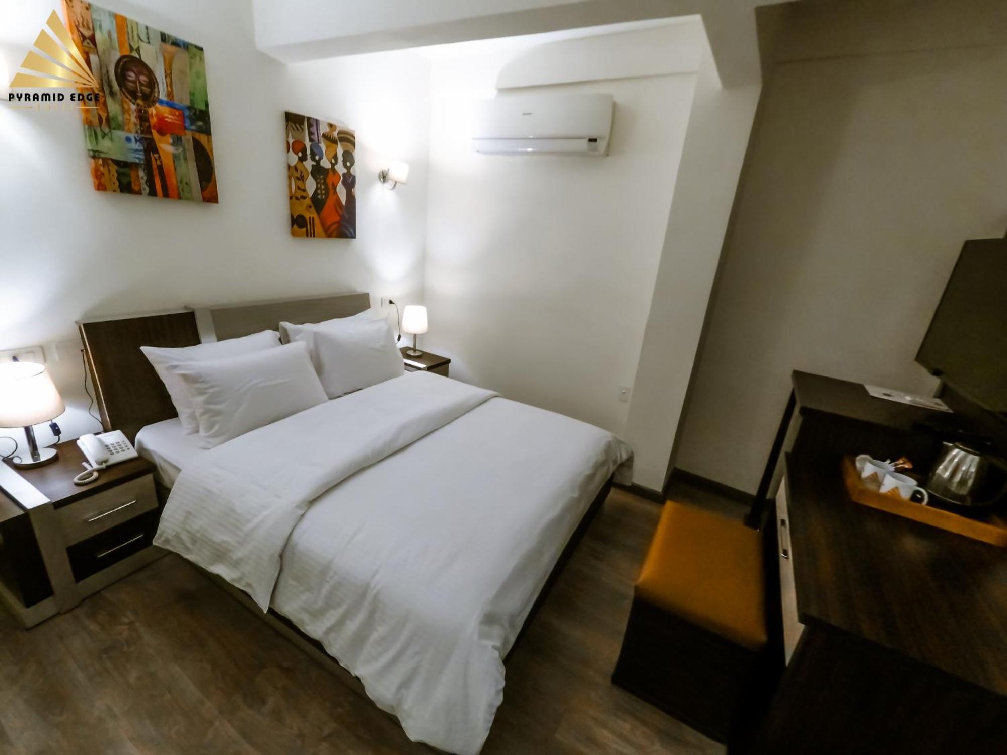 Pyramid Edge Hotel & Exclusive Pyramids View Rooftop Kafret el-Gabal 외부 사진